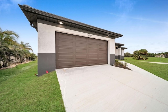 garage with a yard