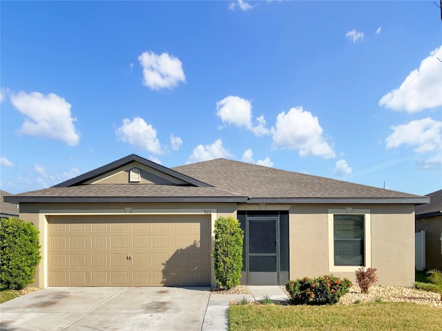 ranch-style home with a garage