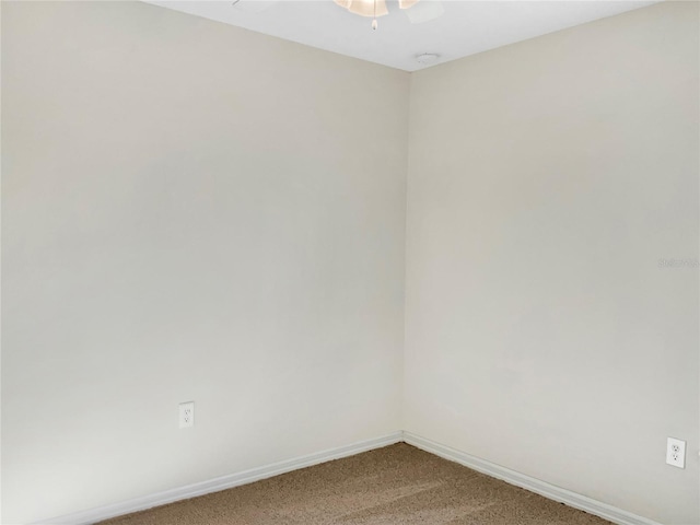 unfurnished room with carpet flooring