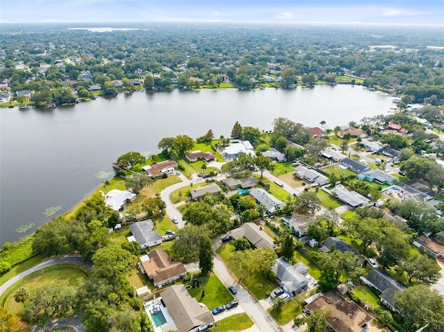 bird's eye view featuring a water view and a residential view