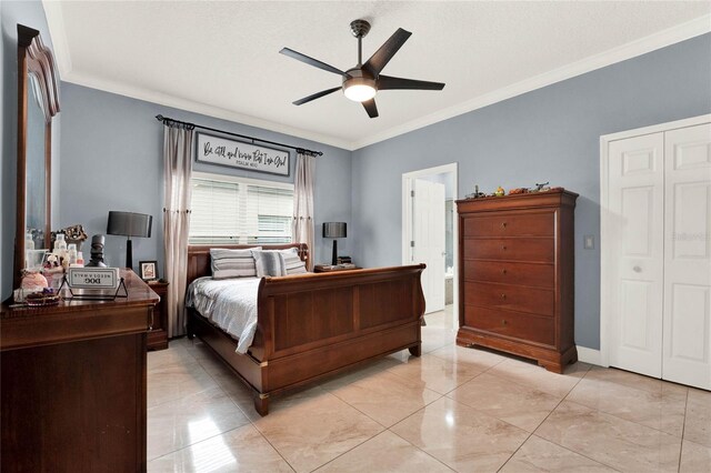 bedroom featuring ceiling fan and ornamental molding