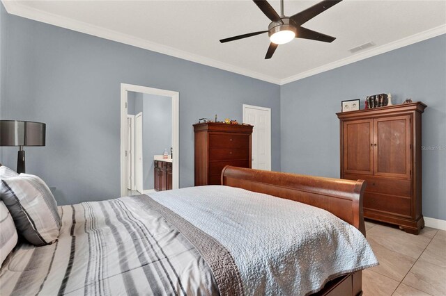 bedroom with connected bathroom, crown molding, light tile patterned flooring, and ceiling fan