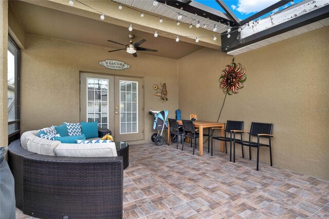 view of patio / terrace with outdoor lounge area and ceiling fan