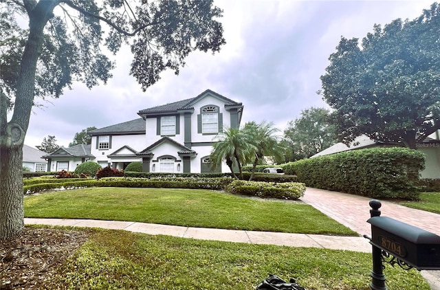 view of front of home featuring a front lawn