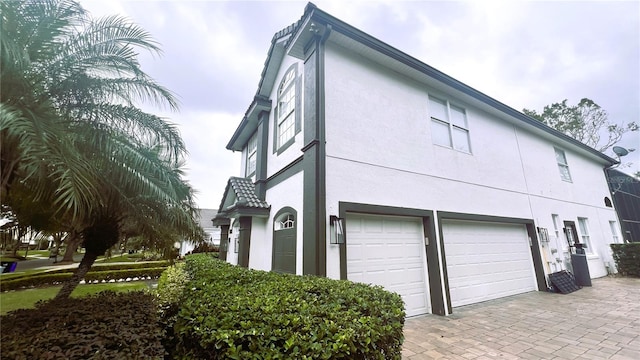 view of home's exterior with a garage