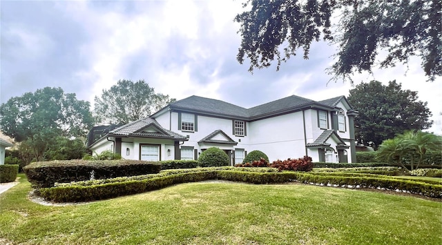 view of front of house with a front lawn