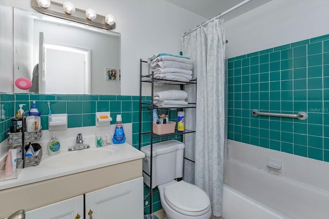 full bathroom with tile walls, vanity, shower / tub combo with curtain, and toilet