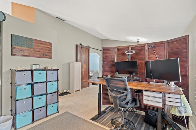 tiled home office with a barn door