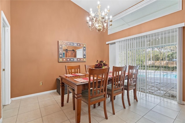 tiled dining room featuring a notable chandelier