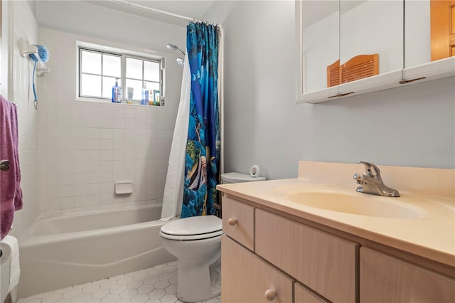 full bathroom featuring toilet, shower / tub combo with curtain, vanity, and tile patterned floors