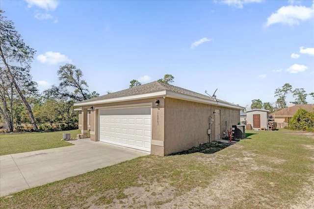 view of side of property featuring a yard, a storage shed, central AC unit, and a garage