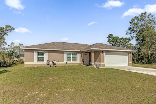 single story home with a garage and a front lawn