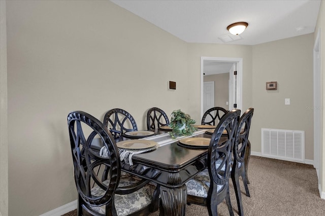 view of carpeted dining room