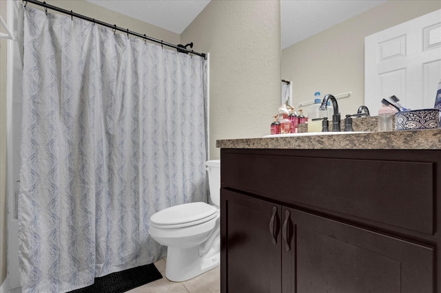 bathroom with vanity, toilet, tile patterned flooring, and a shower with shower curtain