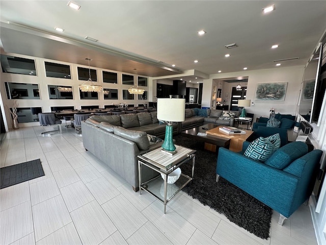 living room with an inviting chandelier