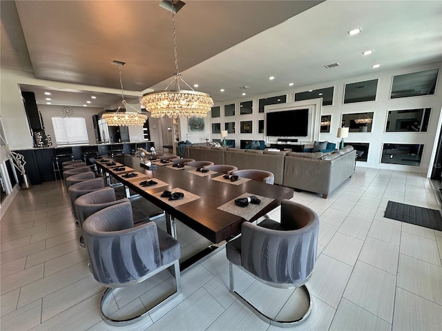 dining space with a notable chandelier