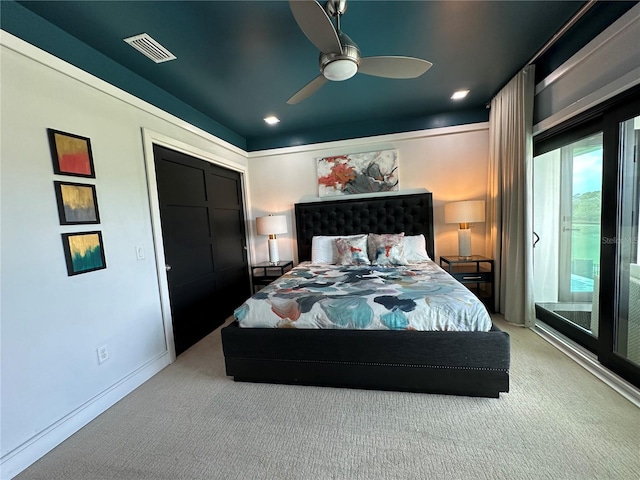 bedroom with ceiling fan, carpet flooring, access to exterior, and a closet