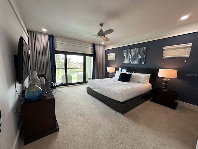 bedroom with ceiling fan and carpet floors