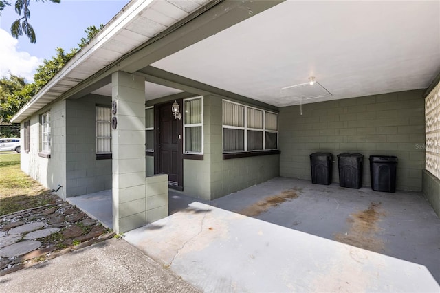 doorway to property featuring a patio area