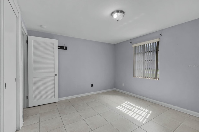 interior space featuring light tile patterned floors