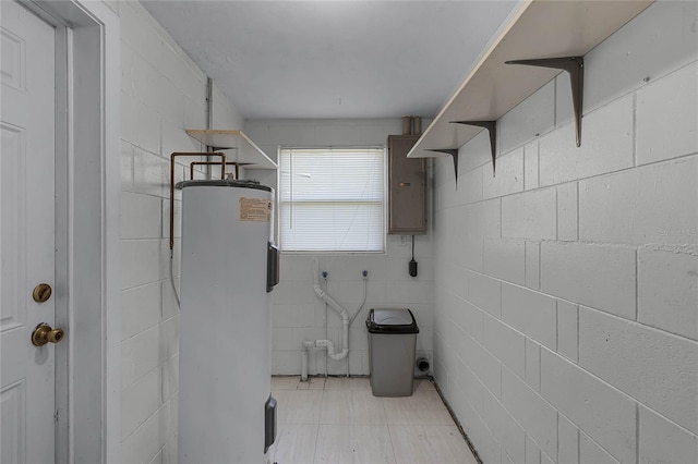 interior space featuring electric dryer hookup, electric panel, and water heater