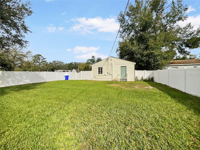 view of yard featuring a fenced backyard and entry steps