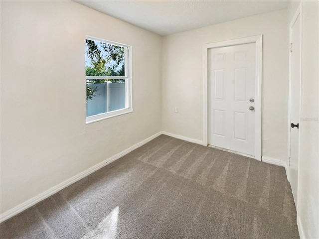 view of carpeted spare room