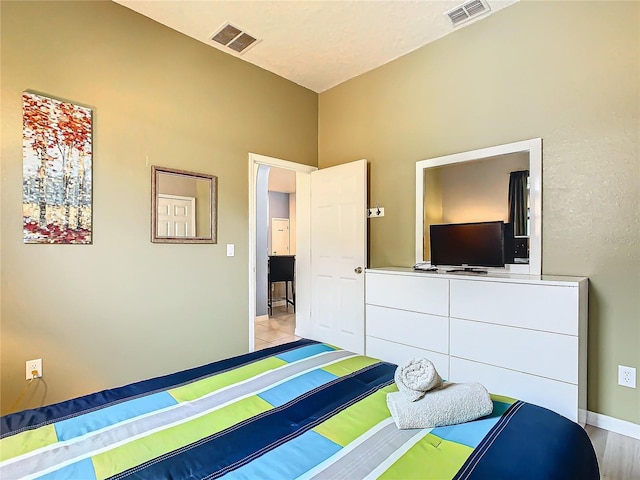 bedroom featuring light hardwood / wood-style floors