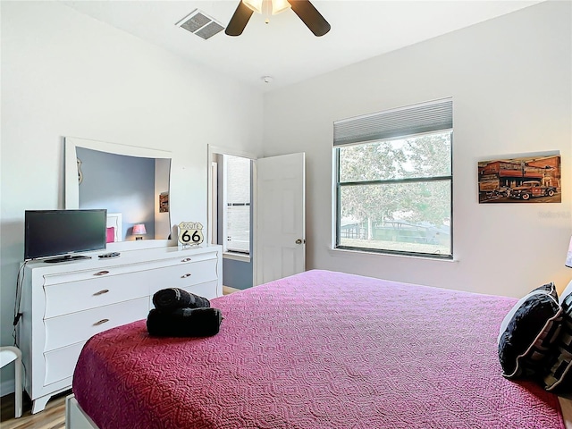 bedroom with light wood-type flooring and ceiling fan