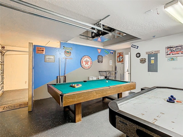 playroom with electric panel, a textured ceiling, and billiards