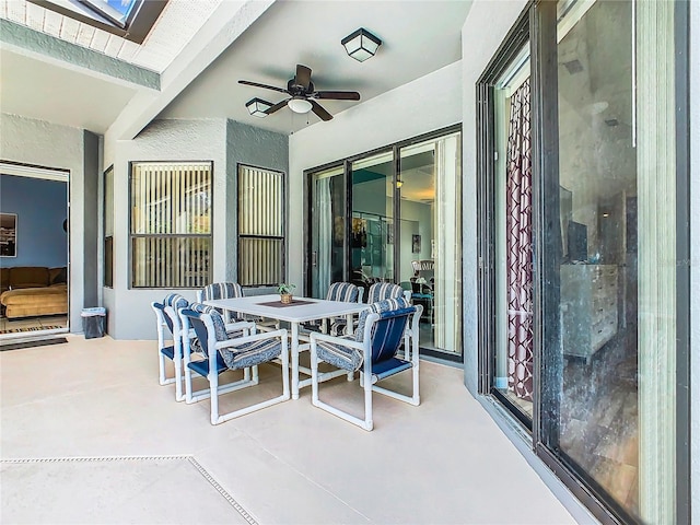 view of patio / terrace featuring ceiling fan