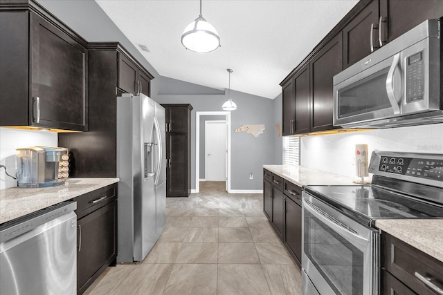 kitchen featuring appliances with stainless steel finishes, backsplash, dark brown cabinetry, lofted ceiling, and pendant lighting