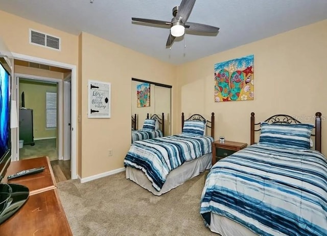 bedroom with hardwood / wood-style flooring and ceiling fan