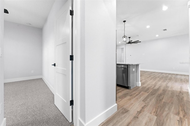 hallway with light wood-type flooring