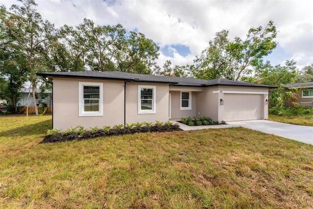 single story home with a garage and a front lawn