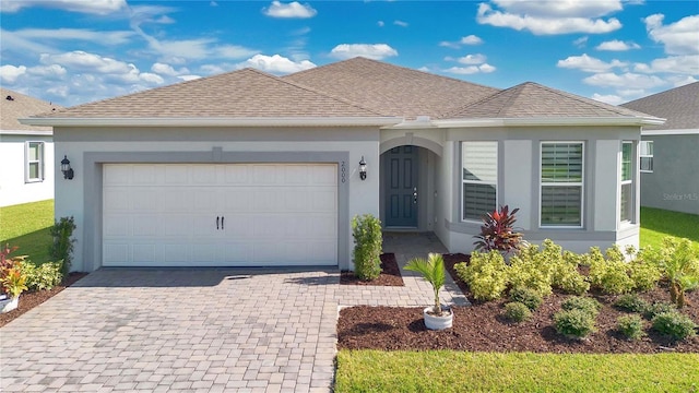 single story home with a garage