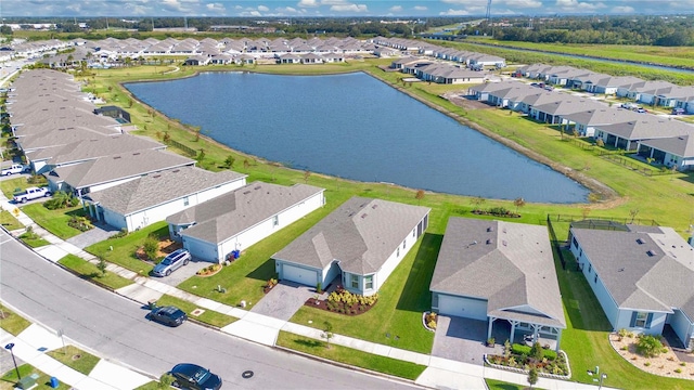 drone / aerial view featuring a water view