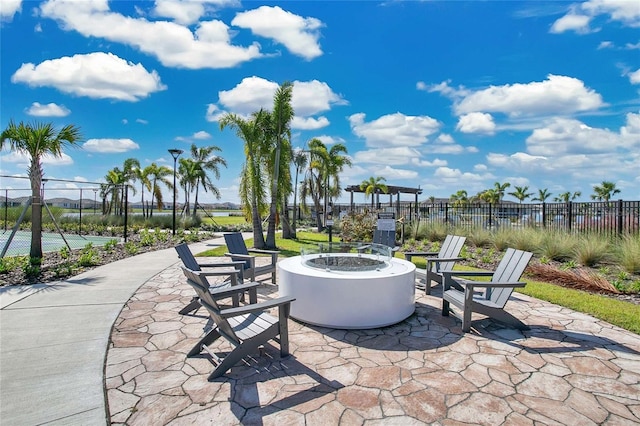 view of patio with an outdoor fire pit