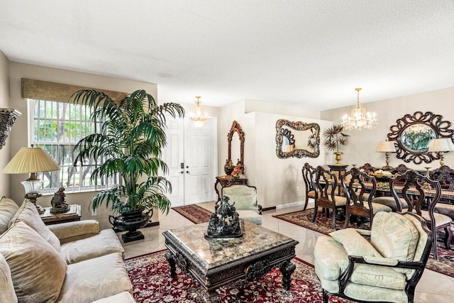 living room with a textured ceiling, light tile patterned floors, and a chandelier