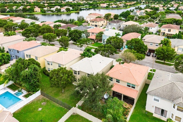 birds eye view of property featuring a water view