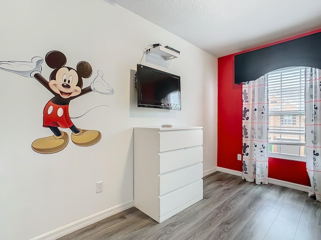 interior space with hardwood / wood-style flooring