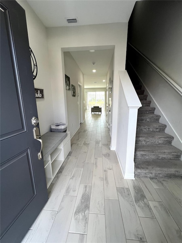 mudroom with light wood-type flooring