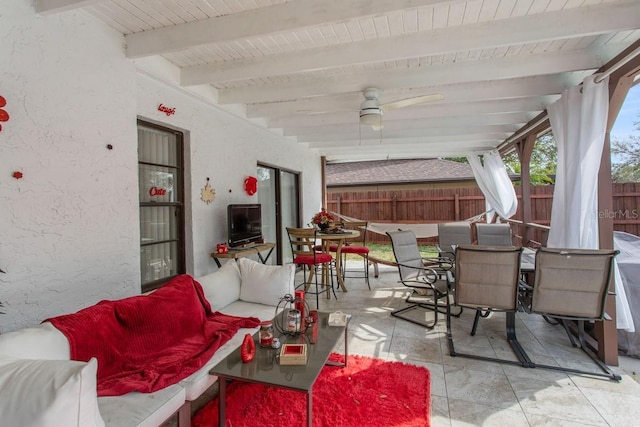 view of patio / terrace featuring ceiling fan