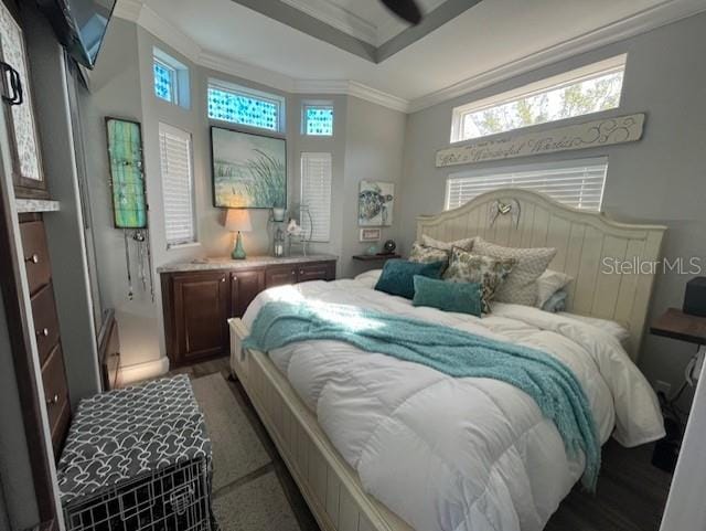 bedroom with ornamental molding