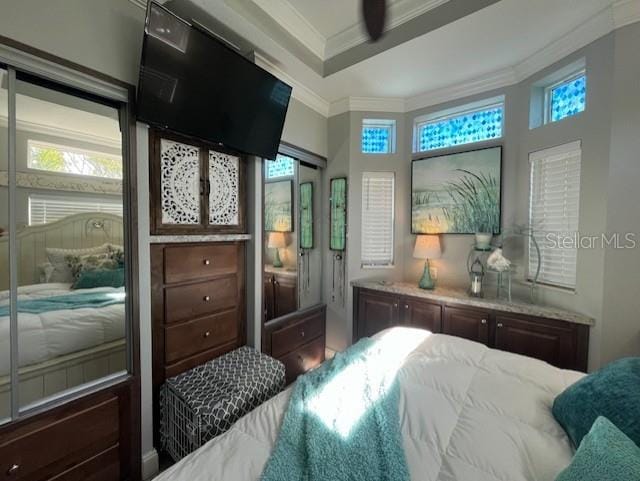 bedroom with ornamental molding