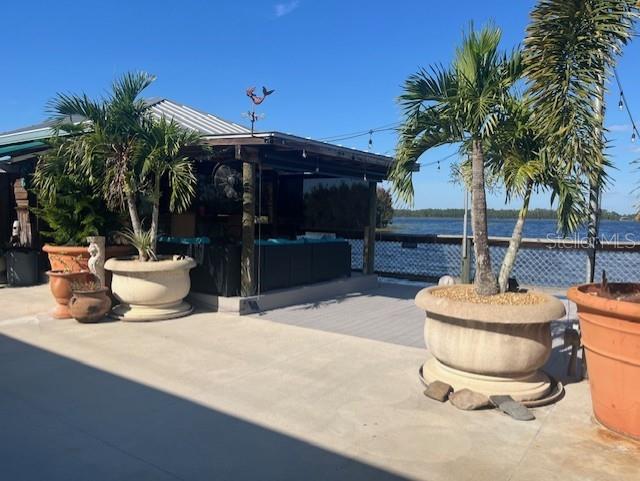 view of patio / terrace featuring a water view