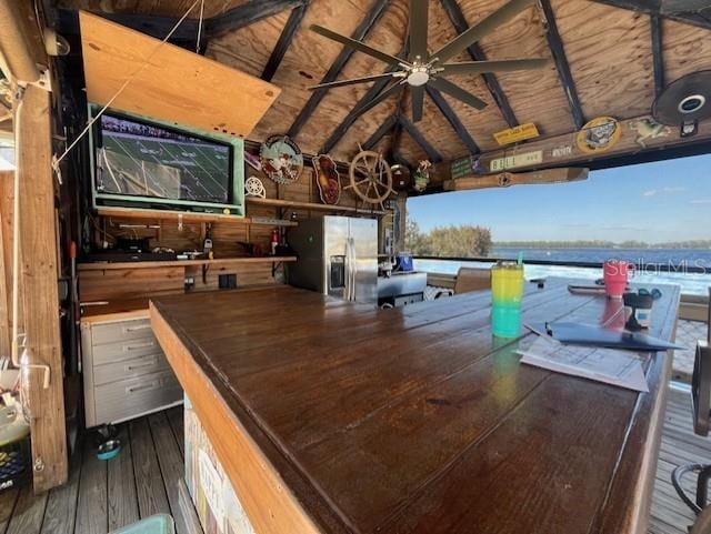 wooden terrace featuring ceiling fan