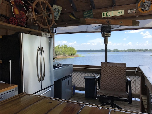 view of patio / terrace featuring a water view