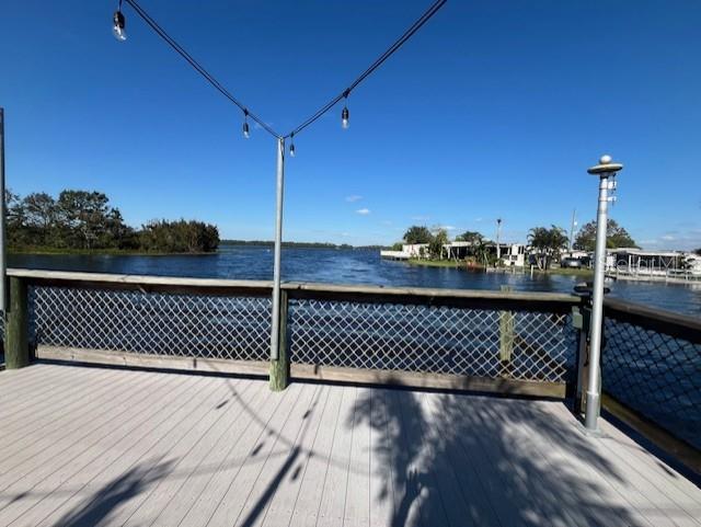 deck featuring a water view