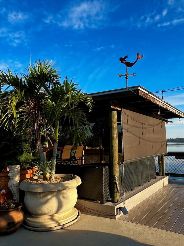 view of outbuilding with a water view